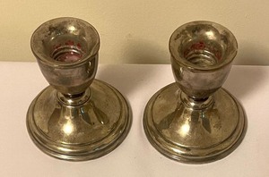 lot 55A image: Pair of Weighted Sterling Silver Candle Holders