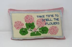 lot 102 image: Needlepoint pillow and footstool
