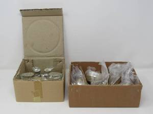 lot 50 image: Votive Glass and silver tea strainer sets