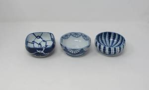 lot 13 image: Pantry staples tea caddy, tea pot, embossed dishes soup tureen, and more