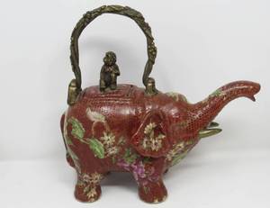 lot 25 image: Collectors Delight  lucky elephant jar and tea pot, china box