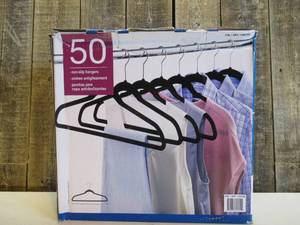 lot 60 image: New In Distressed Box. 50 Non-Slip Space-Saving Hangers M61B