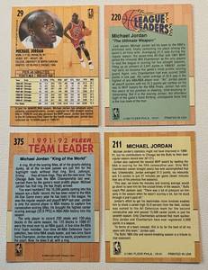 lot 206 image: Michael Jordan 4 Card Lot - 1991 Fleer #29, #211 All-Star, #220 League Leaders, and #375 Team Leader Basketball Cards