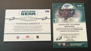 lot 154 image: Donnovan McNabb 2 Card Numbered Patch Lot - 2002 Fleer Hot Materials #HM-DM numbered 2350 only 50 made 2004 Donruss Elite Dridiron Gear numbered 43250 Football Cards