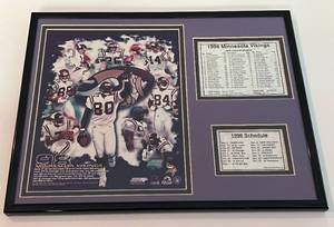 lot 241 image: 1998 Minnesota Vikings Framed and Matted Team Photo, Schedule, and Roster - Rookie Moss, Chris Carter and more