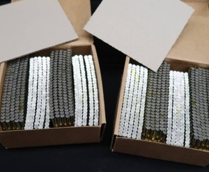 lot 33 image: RING SHANK PLASTIC STRIP ROUND HEAD NAILS 2 NEW BOXES