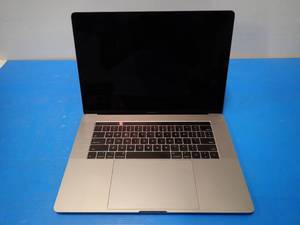 lot 20 image: Apple&nbspMacBookPro14,3 A1707 MPTR2LLA &nbspINTEL(R) CORE(TM) I7-7700HQ CPU  2.80GHZ  16GB DDR4 SDRAM  251GB SSD  15.0 screen with 3360 x 2100 2K resolution  includes IOS  No charger  $375 reserve