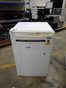 lot 54 image: Mini Fridge  removed from working environment  will need a wipe down