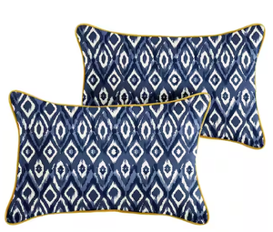lot 64 image: 4 Pack Indigo Graphic with Butter Yellow Rectangular Outdoor Corded Lumbar Pillows Model # HD828811SP Store SKU # 1006606054 NEW