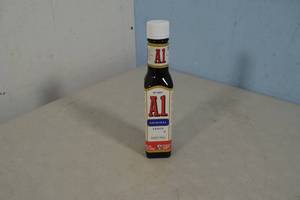 lot 132 image: 4 Bottles of A1 Steak Sauce Best By 62025