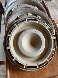 lot 102 image: 4 Hubcaps