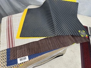 lot 68 image: 3 New Rugs and 15 New Placemats
