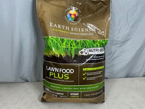 lot 143 image: New 20 lb Bag of Lawn Food Plus