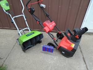 Greenworks 110 snow thrower. Needs paddle repair but does run. Snojoe cordless snow thrower. Untested. No battery or charger. As shown.