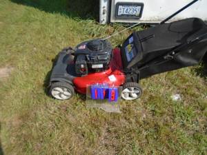 Yard Machine 21 self propeled mower with bagger. Used condition. Tested & works. As shown.