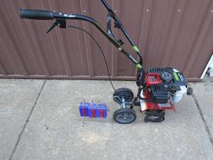 Earthquake viper mini tiller. Looks lightly used. Tested & works. As shown.