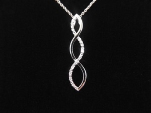 lot 17 image: .925 Sterling Silver Diamond Accented Infinity Pendant Necklace