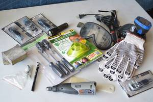 lot 21 image: Hex keys, allen keys, googles, gloves, screw driver set, sanding blocks, psi tire gauge, putty knifespreader, flash light, kitchen shearsscissors,  Dremel tool-with charger and batteries
