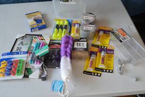 lot 43 image: Office supplies-duct tape, high lighters, crazy glue, pencil sharpeners, permanent markers, organizer tray, head phone ear buds, jute twine, wrist support, storage container, keychain lanyard, Paris picture decor, wine stoppers.