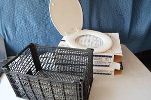 lot 50 image: New toilet seats, never used, removed from a new build model house, no hardware included (minimal cost at hardware store. White in color. 16-14 Round. Enameled wood. Retail $25.26each.