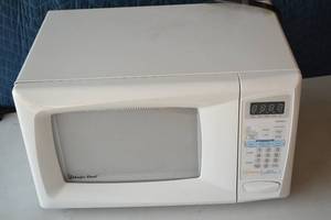 lot 56 image: The Magic Chef 0.7 cu. ft. Countertop Microwave