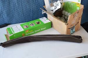 lot 70 image: Duck Double Draft Seal for Doors  Assorted Light Bulbs