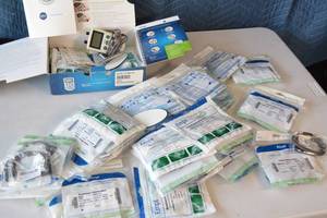 lot 100 image: Empi Pain Management TENS Unit with Electrode Stickers