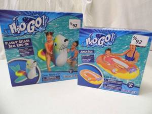 New In Box Floating Boat and Seal Ride On