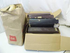 Box and a Bag full of antique piano rolls