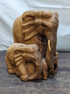 lot 110 image: Large Hand Carved Wood Elephant Herd