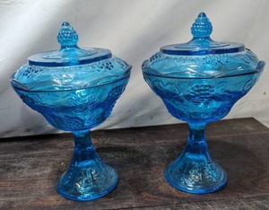 lot 152 image: Two Blue Glass Lidded Compote Bowls By Indiana Glass Company