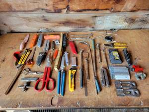 lot 32 image: Assorted Hand Tools - Gerber Multi-Tool, Knives, Tin Snips, Blades and More
