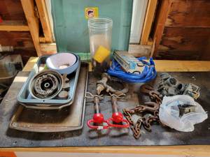 lot 66 image: 7000# Clevis, 1 Hitch Pins, Chain, Carburetors and More - NO SHIPPING