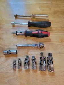 lot 111 image: Lot of Swivel Adapters and More - 12, 38 and 14 Drives