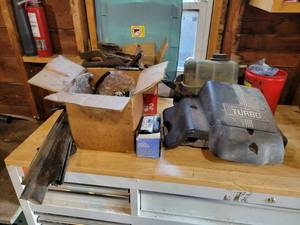lot 137 image: FORD 7.3 IDI Stanadyne Injection Pump, Assorted FORD Parts and More - NO SHIPPING