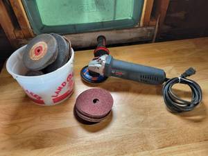 lot 161 image: BOSCH 5 Paddle Switch Angle Grinder and many Grinding Discs- Tested and Works - NO SHIPPING