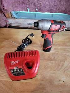 lot 179 image: Milwaukee M12 14 Hex Impact Driver with Battery and Charger - Tested and Works