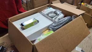 Box of Office supplies and disposable kitchen utensils