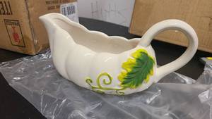 Cute pumpkin or gourd themed gravy dish