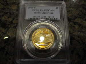 lot 19 image: 2010-S PCGS Certified 416238.6918112448 PF69 Deep Cameo Native American Dollar