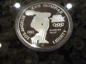 lot 52 image: 1983-S Los Angeles 23rd Olympiad (Discus Thrower) Commemorative Silver Dollar