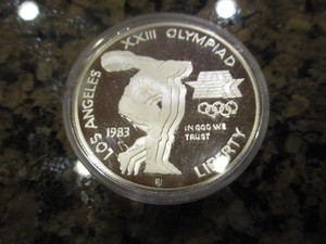 lot 54 image: 1983-S Los Angeles 23rd Olympiad (Discus Thrower) Commemorative Silver Dollar