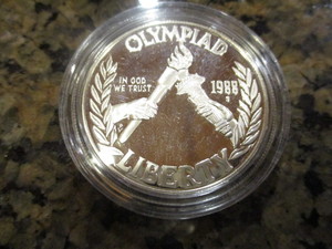 lot 65 image: 1988-S Olympic (Torch Passing) Commemorative Silver Dollar