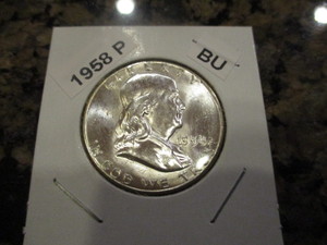 lot 76 image: 1958-P Franklin Silver Half Dollar - Cartwheel effect and Original Mint Luster
