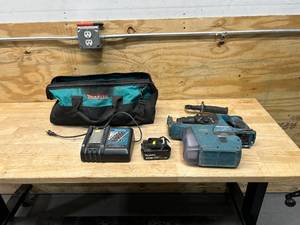 lot 56 image: MAKITA Hammer Drill with HEPA Filter, Charger, Battery and Bag