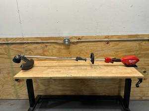 lot 11 image: MILWAUKEE M18 18V Lithium-Ion Brushless Cordless String Trimmer (Tool-Only)