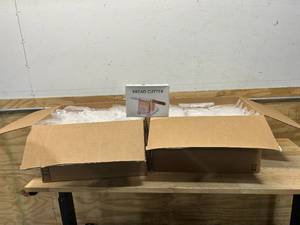 lot 118 image: Lot of 44 Bread Cutters