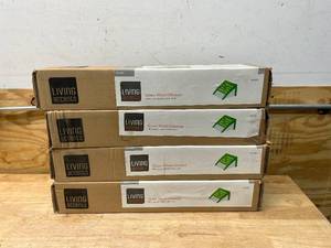 lot 125 image: LIVING ACCENTS Lot of 4- Green Wood Ottomans