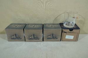 lot 129 image: 4 Lucky Shot Whiskey Glasses with Bullet USA