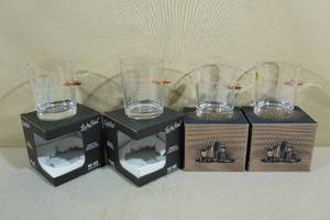 lot 130 image: 4 Lucky Shot Whiskey Glasses with Bullet Assorted Sayings
